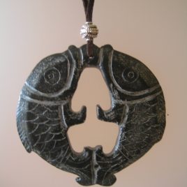 Black jade pendant,75 mm diameter and brown suede